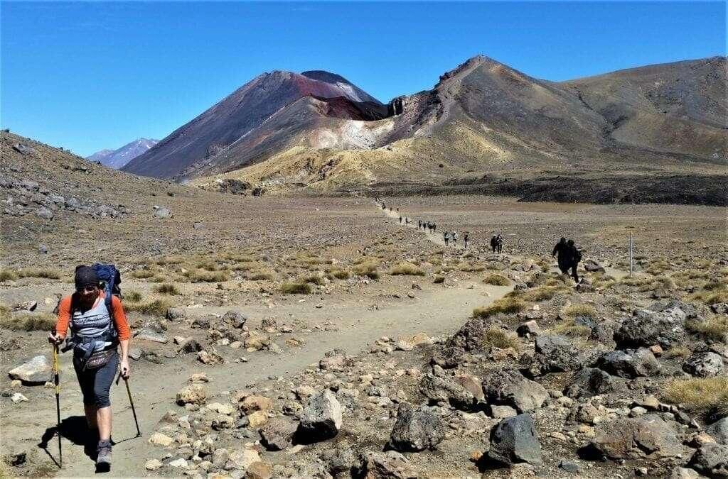 Person hiking in mountains as training