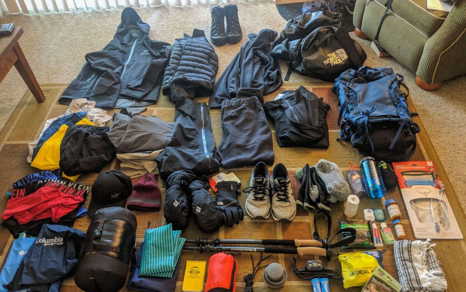 Assortment of essential hiking gear for Kilimanjaro
