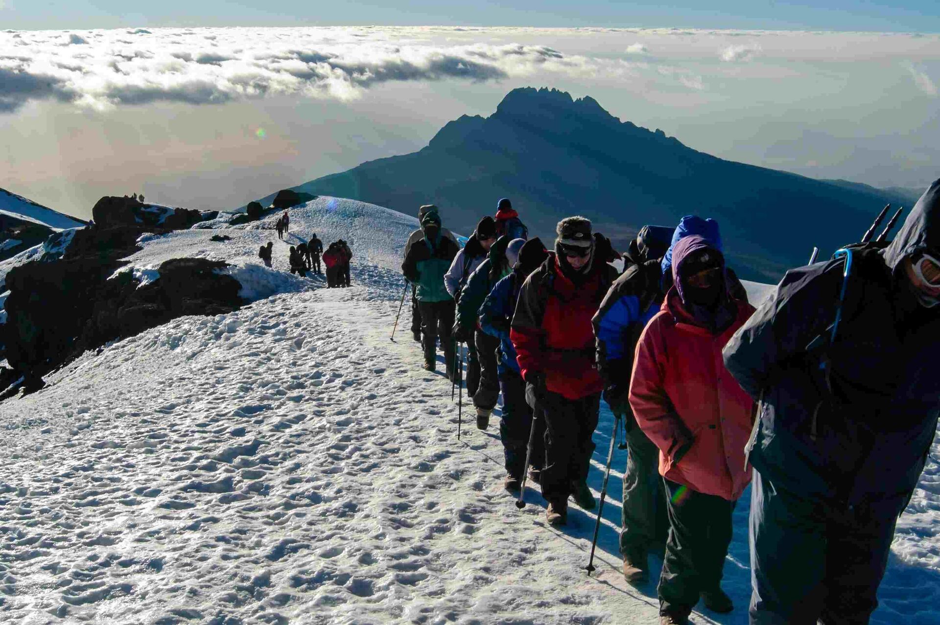 Hikers approaching Kilimanjaro summit